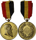 Leopoldo II (1865-1909), Re del Belgio. Medaglia 1892. AE dorato. 51.50 mm. R. Appiccagnolo e nastrino originale. Bel BB.