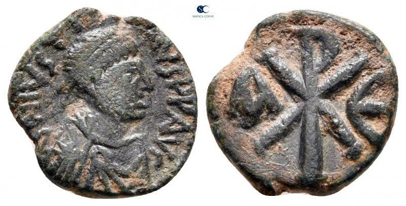 Justin I AD 518-527. Constantinople
Pentanummium Æ

14 mm, 1,51 g



very...