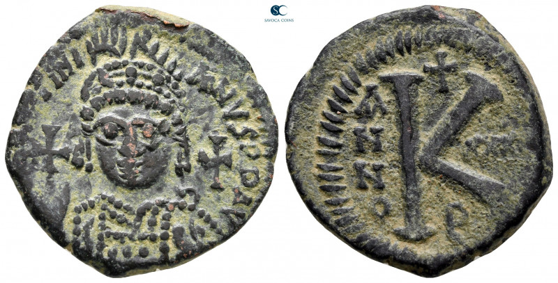 Justinian I AD 527-565. Constantinople
Half Follis or 20 Nummi Æ

28 mm, 9,75...