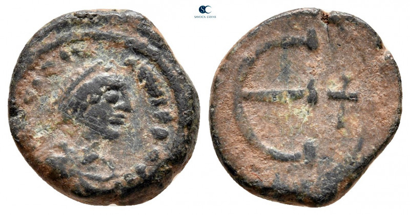 Justinian I AD 527-565. Constantinople
Pentanummium Æ

14 mm, 1,86 g



v...
