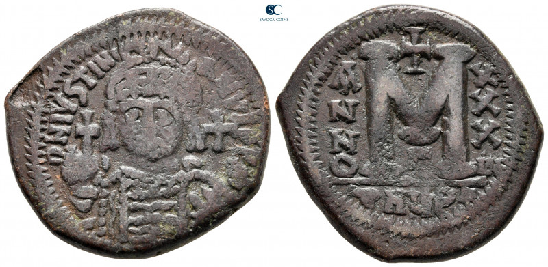 Justinian I AD 527-565. Theoupolis (Antioch)
Follis or 40 Nummi Æ

33 mm, 18,...