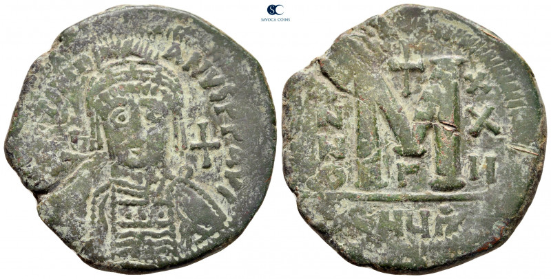 Justinian I AD 527-565. Theoupolis (Antioch)
Follis or 40 Nummi Æ

37 mm, 18,...