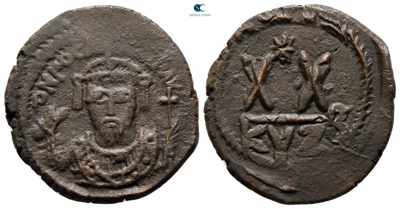 Phocas AD 602-610. Cyzicus
Half Follis or 20 Nummi Æ

23 mm, 5,31 g



ve...