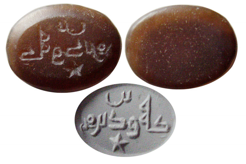 EARLY ISLAMIC. Ca. 8th-10th. Century AD. Kufic Ring Seal, Agate (0.66 gm; 14mm x...