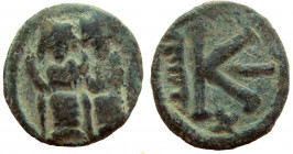 Umayyad Caliphate. Arab-Byzantine coinage. AE 18 mm. Baysan (Scythopolis) mint.