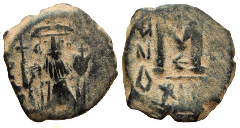 Umayyad Caliphate. Arab-Byzantine coinage. Standing emperor type. AE fals.
20 m...