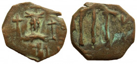 Umayyad Caliphate. Arab-Byzantine coinage. Standing Emperor type. AE Fals. Syria and Palestine mint. Based on Constans II type.