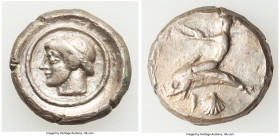 CALABRIA. Tarentum. Ca. 480-450 BC. AR didrachm (18mm, 7.80 gm, 5h). VF, tooled. TARAS (retrograde), Taras astride dolphin left, both hands outstretch...