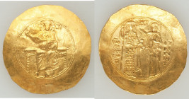 John II Comnenus (AD 1118-1143). AV hyperpyron (32mm, 4.36 gm, 6h). VF, wrinkled. Constantinople. Christ seated facing on backless throne, wearing nim...