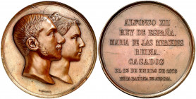 1878. Boda de Alfonso XII y María de las Mercedes. (V. 476) (V.Q. 14394) (Ruiz Trapero 829). Grabador: G. Sellán. Golpecitos. Bronce. 244 g. Ø70 mm. E...