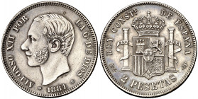 1881*1881. Alfonso XII. MSM. 2 pesetas. (AC. 28). Buen ejemplar. Pátina. Parte de brillo original. Rara así. 9,92 g. EBC-.