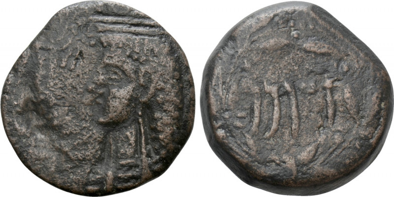 SICILY. Cossura. Ae (2nd century BC). 

Obv: Draped bust of Isis left; Nike ad...