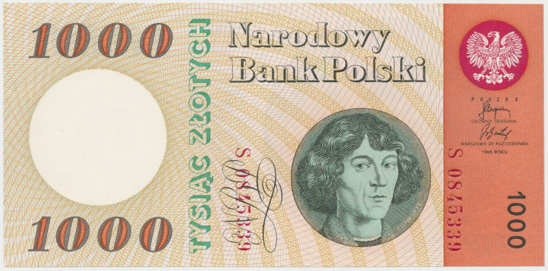 1.000 złotych 1965 - S Złamana końcówka lewego, górnego narożnika i dwie nagniot...