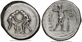 PAMPHYLIA. Aspendus. Ca. 325-250 BC. AR stater (25mm, 1h). NGC Choice VF, flan flaws. Two wrestlers grappling; KY between / ΕΣΤFΕΔΙΥ, slinger standing...