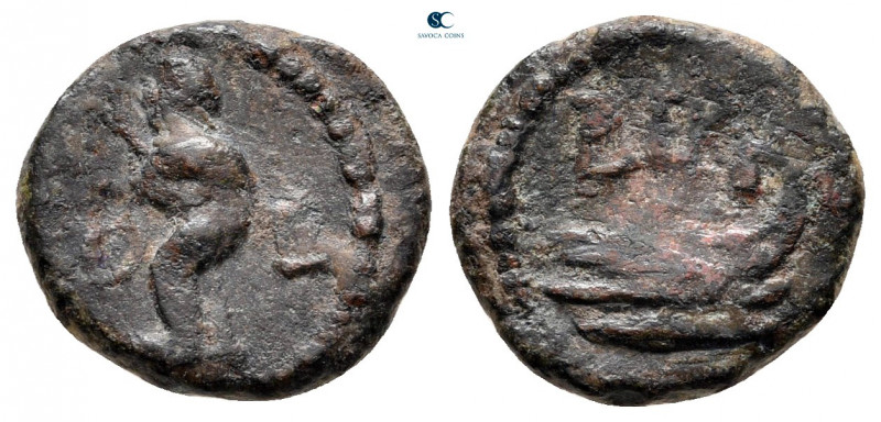 Phoenicia. Berytus circa AD 1-100. 
Bronze Æ

11 mm, 1,58 g



nearly ver...