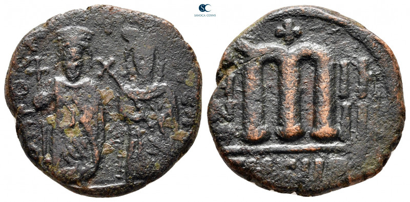 Phocas, with Leontia AD 602-610. Theoupolis (Antioch)
Follis or 40 Nummi Æ

2...