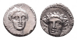 Greek Obol, Ca. 350-300 BC. AR
CILICIA, Nagidos. Circa 400-380 BC. AR Obol
Obv: Head of Aphrodite facing slightly right.
Rev: Wreathed head of youn...