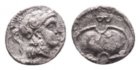 Greek Obol, Ca. 350-300 BC. AR
Cilicia, Balakros 333-323 BC, AR obol, Tarsos.
Obv: Helmeted head of Athena right
Rev: Boeoetian shield. In left fie...