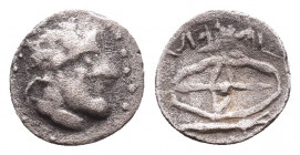 Kingdom of Bosporos, Leukon II AR Obol.
Pantikapaion, circa 250-220 BC. Magistrate, .....
Laureate head of Zeus right / Dagger and shield; .

Unpu...