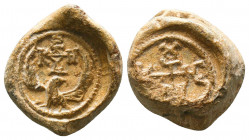 Byzantine lead seal of Constantine officer(7th cent.)
Obverse:Eagle with open wings to right, invocative cruciform monogram over itshead, resolved as...