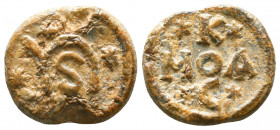 Byzantine lead seal of Kosmas asekretes(first half of 7th cent.)
Obverse: Five letters in cruciform shape: ΚΟCΜΑ=Κοσμᾶ (Of Kosmas), allwithin wreath ...