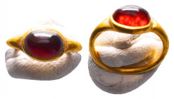 Ancient Roman Gold Ring with a precious ceylon red stone, circa 1st - 3rd AD.

Provenance: Property of Dara Collections
Condition: Very Fine

Wei...