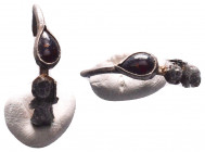 Ancient Roman Silver Earring with a precious ceylon red stone, circa 1st - 3rd AD.


Condition: Very Fine




Weight: 1.6 gr
Diameter: 24 mm