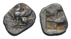 THRACE. Abdera. Circa 500-480 BC.AR Obol. Griffin seated to left, right forepaw raised / Quadripartite incuse square. HGC 3.2, 1153.Very fine.

Weight...