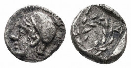 AEOLIS.Elaia.Circa 350-320 BC.AR Obol.Helmeted head of Athena left, pellet behind / Olive wreath, EΛA below.SNG Kayhan 81.Very fine.

Weight : 1.3 gr
...