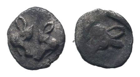 LESBOS.Uncertain mint.5th century BC.AR Obol.Confronted boars' heads / Head of b...