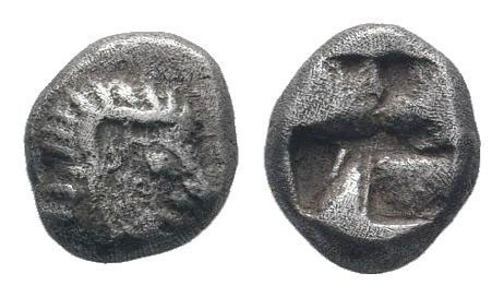 IONIA.Kolophon. Circa late 6th Century BC. AR Tetartemorion. Archaic head of Apo...