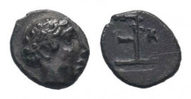IONIA.Kolophon. 525-490 BC. AR Tetartemorion. Head of Apollo right / Incuse square with T-e monogram and grain ear. Milne Kolophon 34.Very fine.

Weig...