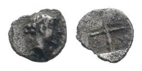 IONIA.Kolophon. 5th century BC.AR Tetartemorion.Laureate head of Apollo right / Quadripartite incuse square. Klein 400 var.Very fine.

Weight : 0.2 gr...