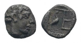 IONIA.Kolophon.5th century BC.AR Tetartemorion.Laureate head of Apollo right / TE monogram, stork standing right, at left, all within incuse square. M...
