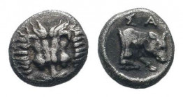 IONIA. Samos.Circa 400-380 BC.AR Obol.Facing scalp of lion / ΣΑ, Head and neck of bull right, all within incuse circle. BMC 79-80; HGC 6, 1227. Good v...