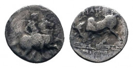 IONIA. Magnesia ad Maeandrum.Circa 350-325 BC.AR Hemidrachm.Warrior on horseback right, holding spear / MAΓN ΣIMΩN, bull butting left, grain ear to le...