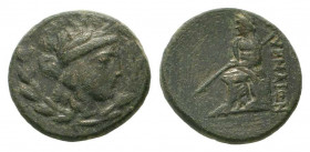 IONIA.Smyrna.Circa 75-50 BC.AE Bronze.Laureate head of Apollo right; laurel wreath border / ΞMYPNAIΩN, Homer seated left, resting chin on hand and hol...