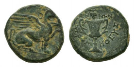 IONIA.Teos.Circa 370-330 BC. AE Bronze. Griffin seated right, left forepaw raised / ΤΗΙΩΝ ΠPOMHΘEYΣ, Grape bunch over kantharos.Leschhorn p. 778.Very ...