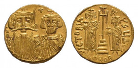 CONSTANS II. 663-668 AD.Constantinople mint.AV Solidus. dN CONSƮANVS, facing busts of Constans, on left with long beard, plumed helmet and chlamys, an...