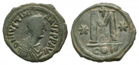 JUSTIN I.518-527 AD.Constantinople mint.AE Follis.DN IVSTINVS PP AVG, pearl diademed, draped, cuirassed bust right / Large M, star left, cross above, ...