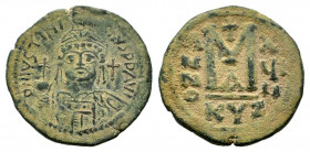 JUSTINIAN I.527-565 AD. Cyzicus mint.AE Follis.DN IVSTINIANVS PP AVG, helmeted, cuirassed bust facing, holding cross on globe and shield with horseman...