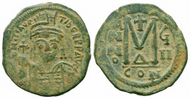 MAURICE TIBERIUS.582-602 AD.Constantinople Mint.AE Follis.DN MAVRIC TIBER PP AVG; Helmeted and cuirassed bust facing, holding globus cruciger / Large ...
