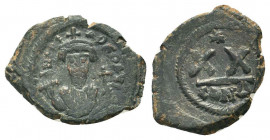 PHOCAS. 602-610 AD.Constantinople mint.AEHalf Follis.Crowned facing bust, wearing consular garb, holding mappa and cross, cross in left field / Large ...