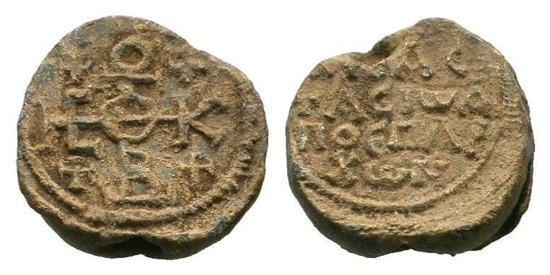 BYZANTINE LEAD SEAL.Circa 7 th-12th Century AD.PB Seal.Cruciform monogram / Lege...