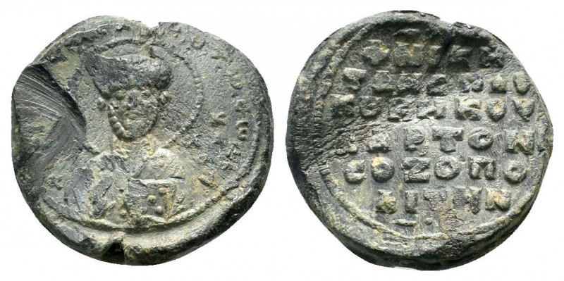 BYZANTINE LEAD SEAL.Circa 11 th Century.PB Seal.Nimbate facing bust of Saint Bas...