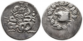 Mysia, Pergamon AR Cistophoric Tetradrachm. Circa 76-67 BC. Serpent emerging from cista mystica; all within ivy wreath / Two serpents entwined around ...