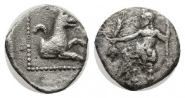 LYCAONIA, Laranda. Circa 324/3 BC. AR Obol (11 mm, 0.60 g). Baaltars seated left, torso facing, holding grain ear and grape bunch in extended right ha...