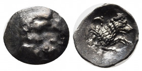 LYCAONIA, Laranda. Circa 324/3 BC. AR Obol (11mm, 0.69g) Baaltars seated left, holding grain ear, grapes, and scepter / Forepart of wolf right; invert...