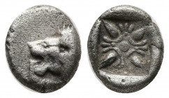 Ionia. Miletos circa 520-470 BC. Diobol AR 9,5mm., 1.05g. Forepart of lion to right, head turned back to left / Star-shaped floral ornament within inc...