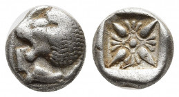 Ionia. Miletos circa 520-470 BC. Diobol AR 9mm., 1.07g. Forepart of lion to right, head turned back to left / Star-shaped floral ornament within incus...